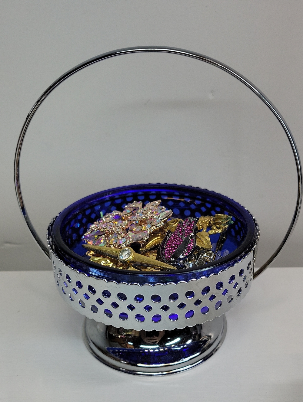 Blue Glass and Silver Decorative Basket Filled With Brooches